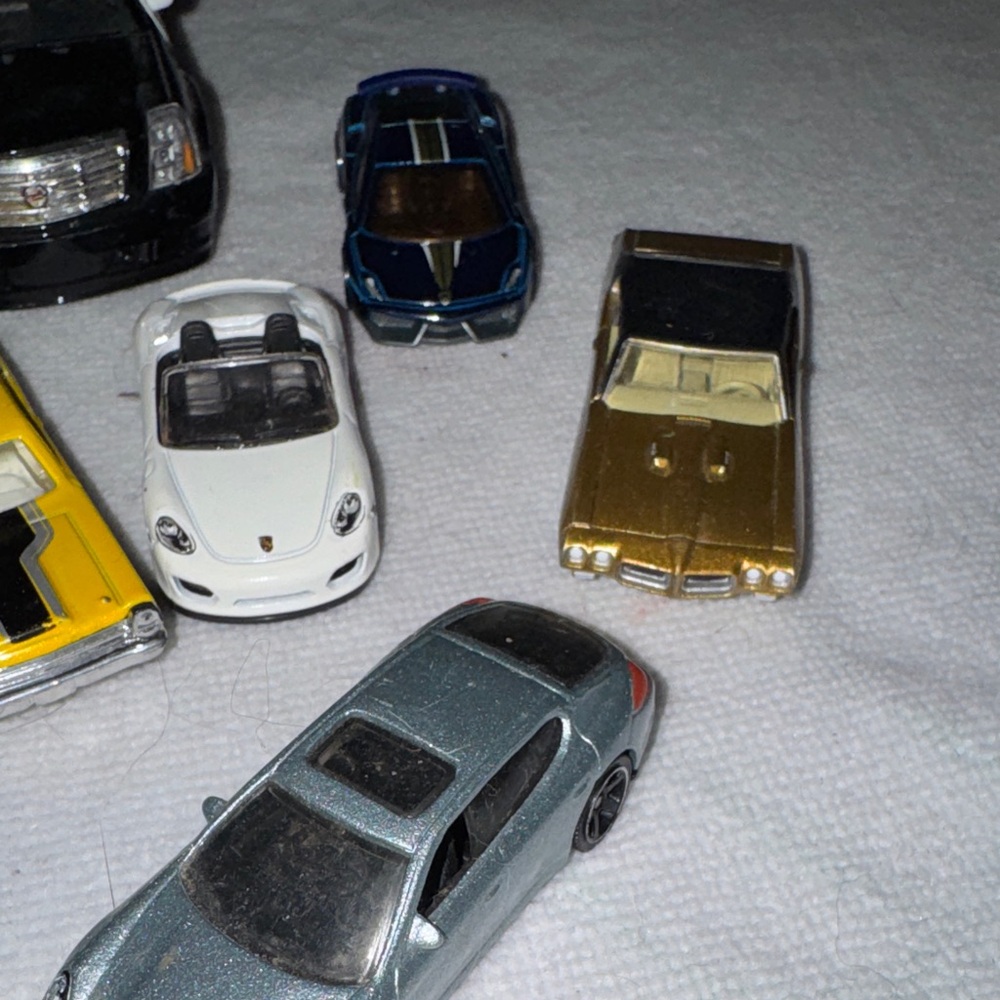 Die-Cast Toy Car Collection with Black, White, and Gold Vehicles - Picture 4 of 5